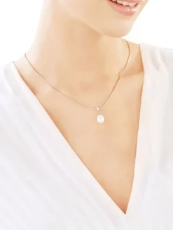 Zawieszka z białego złota z brylantami i perłą - próba 585