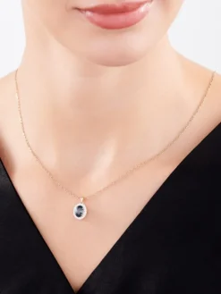 Zawieszka z białego złota z brylantami i topazem London Blue - próba 585