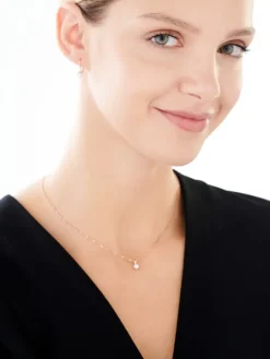 Zawieszka z różowego i białego złota z brylantem - 0,14 ct - próba 585