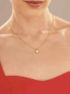 Zawieszka z żółtego i białego złota z brylantem - SI2/H - 0,50 ct - próba 585