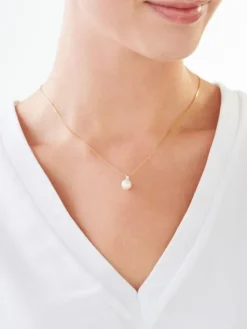 Zawieszka z żółtego i białego złota z diamentem i perłą - próba 585