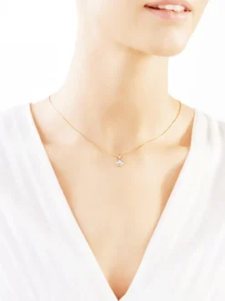 Zawieszka z żółtego i białego złota z brylantem - 0,07 ct - próba 585