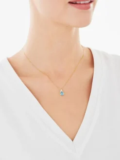 Zawieszka z żółtego i białego złota z diamentem i topazem - próba 375