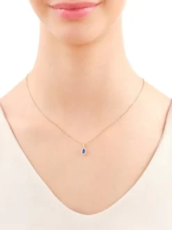 Zawieszka z żółtego i białego złota z diamentami i szafirem - próba 585