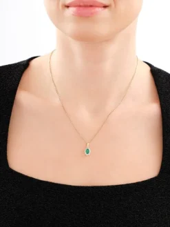 Zawieszka z żółtego i białego złota z diamentami i szmaragdem - próba 585