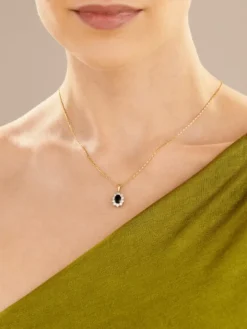 Zawieszka z żółtego i białego złota z brylantami i szafirem - próba 585