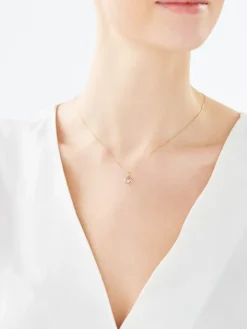 Zawieszka z żółtego i białego złota z brylantem - serce - 0,01 ct - próba 375