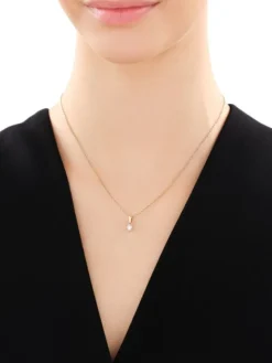 Zawieszka z żółtego i białego złota z brylantem - 0,10 ct - próba 585