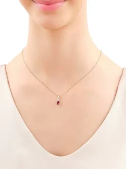 Zawieszka z żółtego i białego złota z brylantami i rubinem - próba 585