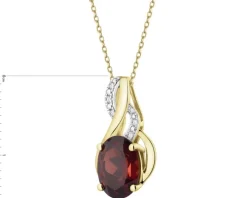 Zawieszka z żółtego złota diamentami i granatem - próba 585