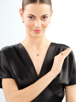 Zawieszka z żółtego złota diamentami i granatem - próba 585