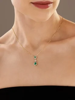 Zawieszka z żółtego złota z brylantami i szmaragdami - próba 585