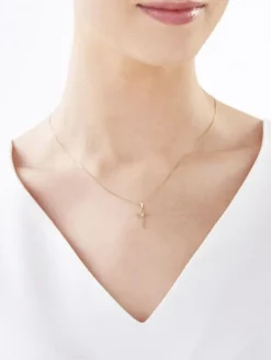 Zawieszka z żółtego złota z brylantem - krzyż - 0,008 ct - próba 375