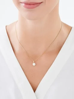 Zawieszka z żółtego złota z brylantami - serce - 0,21 ct - próba 585