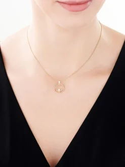 Zawieszka z żółtego złota z brylantem - koło - 0,01 ct - próba 375