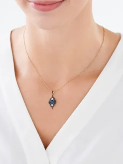 Zawieszka z żółtego złota z brylantami i topazem London Blue - próba 585