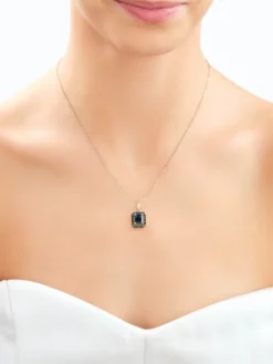 Zawieszka z żółtego złota z czarnymi brylantami i topazem London Blue - próba 585