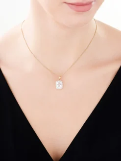 Zawieszka z żółtego złota z diamentami i topazem białym - próba 585