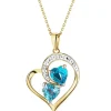 Zawieszka z żółtego złota z diamentami i topazami - serca - próba 375