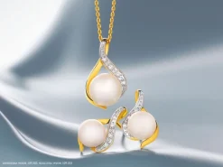 Zawieszka z żółtego złota z diamentami i perłą - próba 375