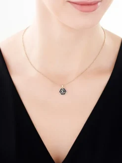 Zawieszka z żółtego złota z diamentem i onyksem - litera K - próba 375