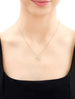 Zawieszka z żółtego złota z diamentami -  serca - 0,01 ct - próba 375