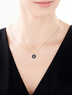 Zawieszka z żółtego złota z diamentem i onyksem - litera A - próba 375