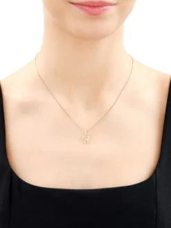 Zawieszka z żółtego złota z diamentem - litera R - 0,003 ct - próba 375