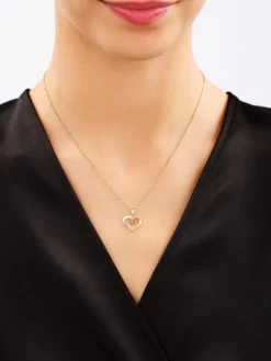 Zawieszka z żółtego złota z diamentami - serca - 0,01 ct - próba 585