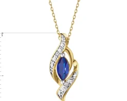Zawieszka z żółtego złota z diamentami i szafirem - próba 585