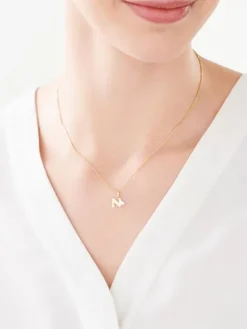 Zawieszka z żółtego złota z diamentem - litera N - 0,004 ct - próba 375