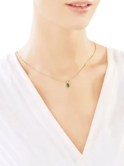 Zawieszka z żółtego złota z diamentem i szmaragdem - próba 585