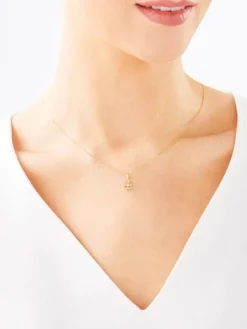 Zawieszka z żółtego złota z diamentem - koniczyna - 0,006 ct - próba 375