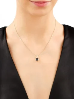 Zawieszka z żółtego złota z diamentami i topazem London Blue - próba 585