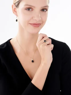 Zawieszka z żółtego złota z diamentami i onyksem - liść - próba 585