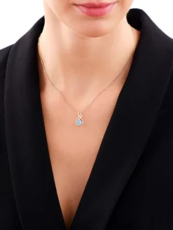 Zawieszka z żółtego złota z diamentem i topazem - próba 585