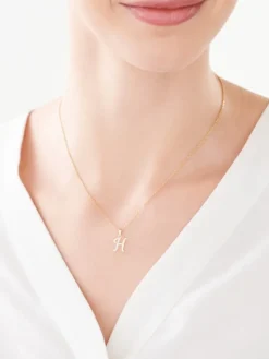 Zawieszka z żółtego złota z diamentem - litera H - 0,003 ct - próba 375