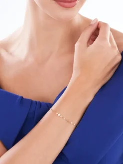 Złota branosoletka z cyrkonią, skręcone blaszki - serce