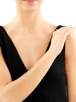 Złota bransoletka - serca, kulki