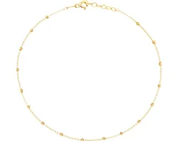 Złota bransoletka na nogę - kulki