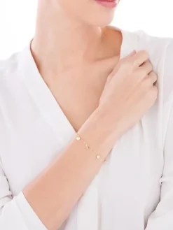 Złota bransoletka, skręcone blaszki - kulki, serca