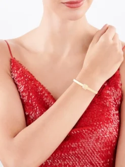 Złota bransoletka sztywna z cyrkoniami