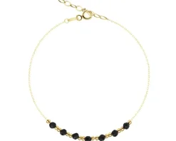 Złota bransoletka z onyksami syntetycznymi - kulki
