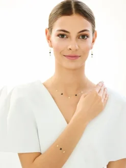 Złota bransoletka z onyksem syntetycznym - motyle