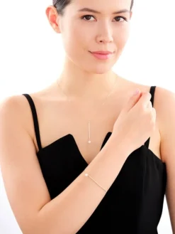 Złota bransoletka z perłą i cyrkoniami, ankier