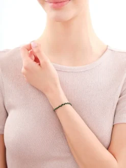 Złota bransoletka z włóknem