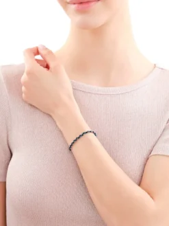 Złota bransoletka z włóknem