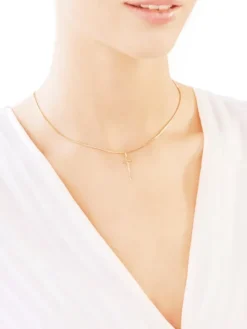 Złota zawieszka - krzyż