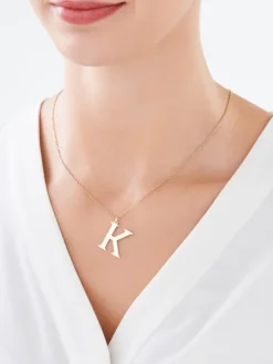 Złota zawieszka - litera K