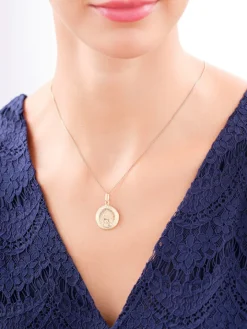 Złota zawieszka - medalik z wizerunkiem Chrystusa